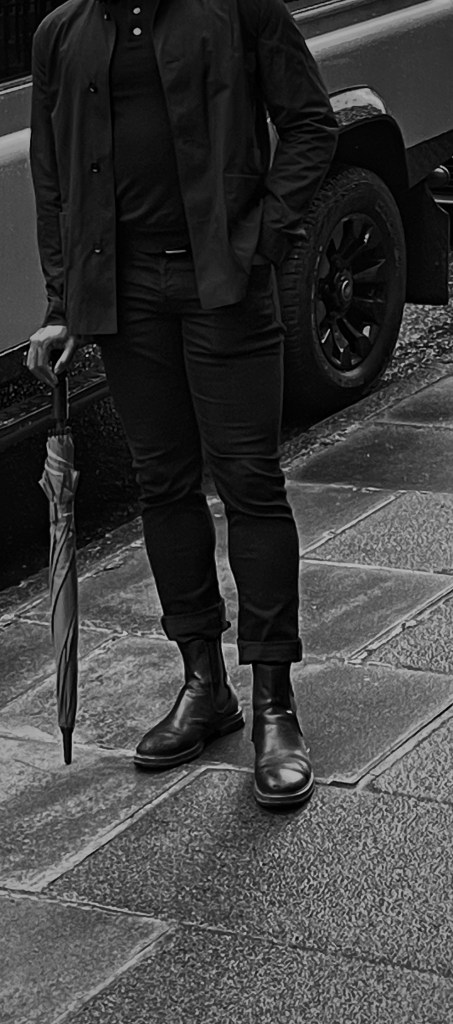 Black Vagabond Chelsea boots styled with tailored trousers — men’s autumn footwear essential in Lance Slate style.